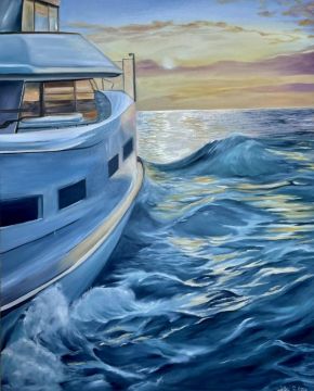 Yacht at sea at sunset