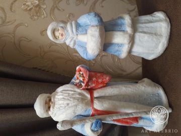 Santa Claus and Snow Maiden made of cotton wool