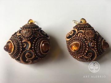Earrings, birch bark inlaid with amber